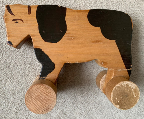 Alte holz kuh auf rollen - holz,